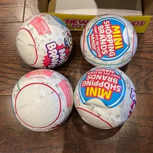 Unopened 4 back of mini brands suprises